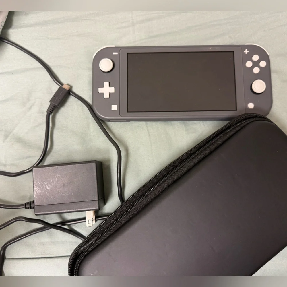 Nintendo Switch Lite Black Handheld Console with Black Charger and Case